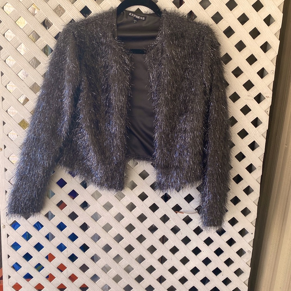 Beautiful dressy short black jacket.  Size Small. Express brand.